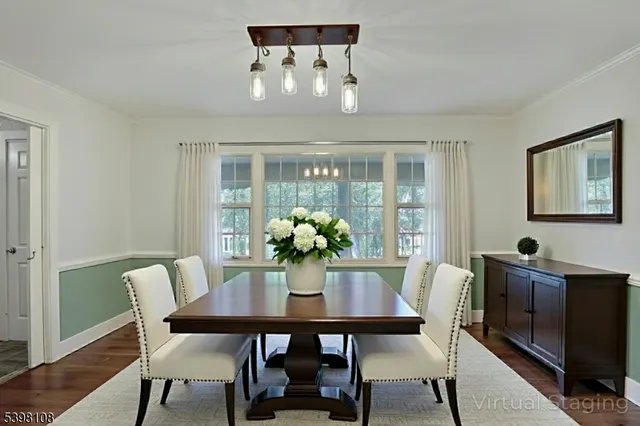 a kitchen with stainless steel appliances granite countertop a sink and a refrigerator
