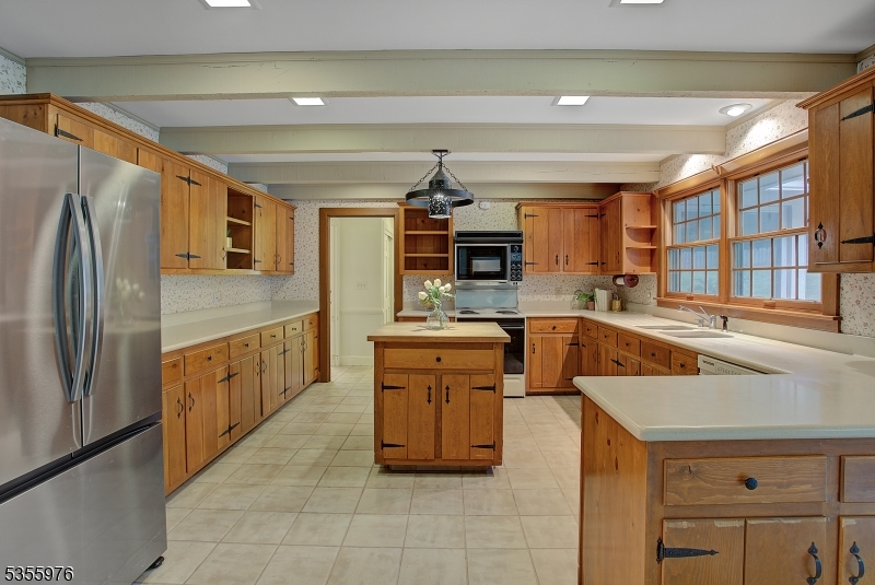 14 William Barnes Road Flemington, NJ 08822 - Photo 5 of 31 a kitchen with stainless steel appliances granite countertop a sink and a refrigerator