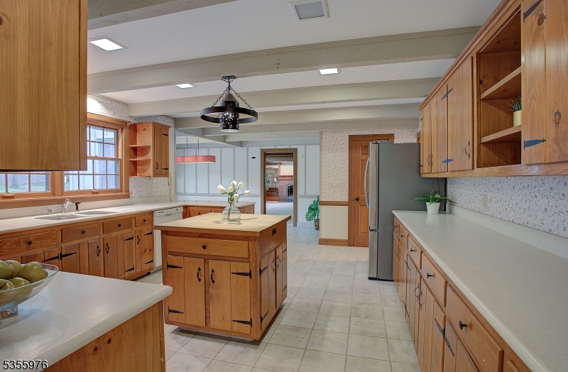 14 William Barnes Road Flemington, NJ 08822 - Photo 6 of 31 a kitchen with a sink stove and cabinets