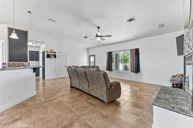 a view of a kitchen with a sink and a window