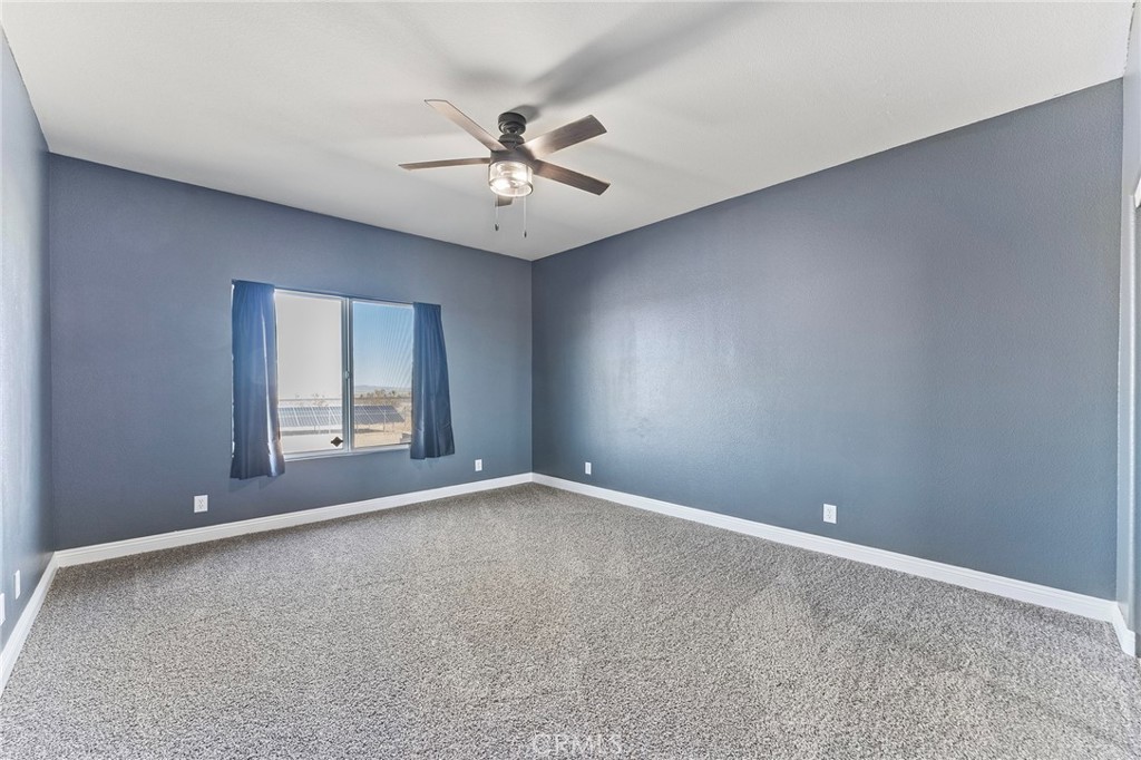 2700 Olivera Road Pinon Hills, CA 92371 - Photo 23 of 37 a view of an empty room with a window