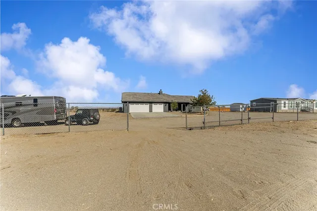 a view of a backyard of a house