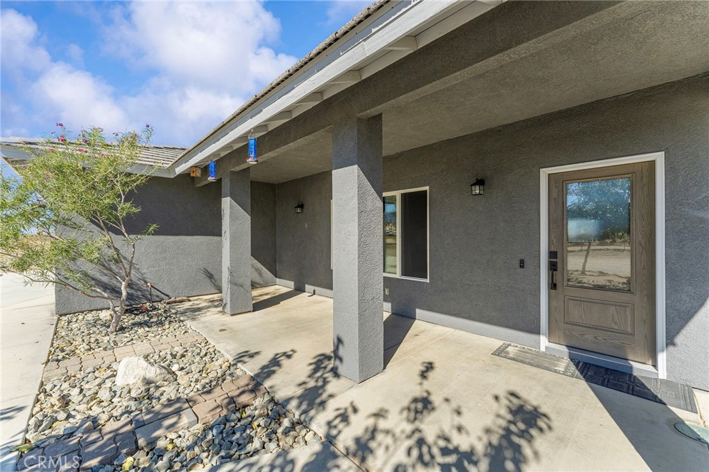 2700 Olivera Road Pinon Hills, CA 92371 - Photo 5 of 37 a view of a backyard of a house