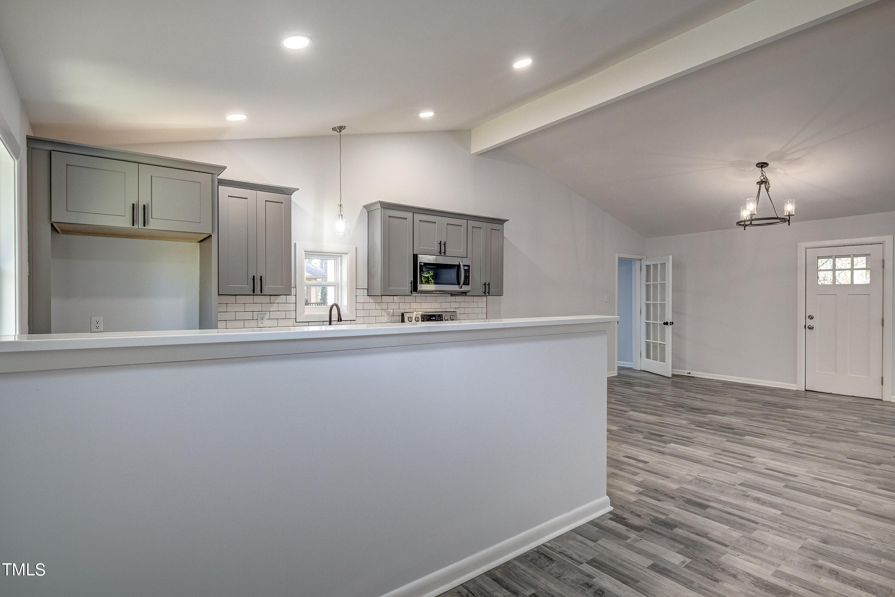 2208 Sanderford Road Raleigh, NC 27610 - Photo 44 of 75 a view of kitchen and kitchen with wooden floor