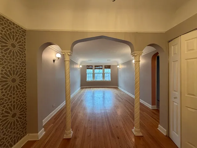 a view of entryway with wooden floor