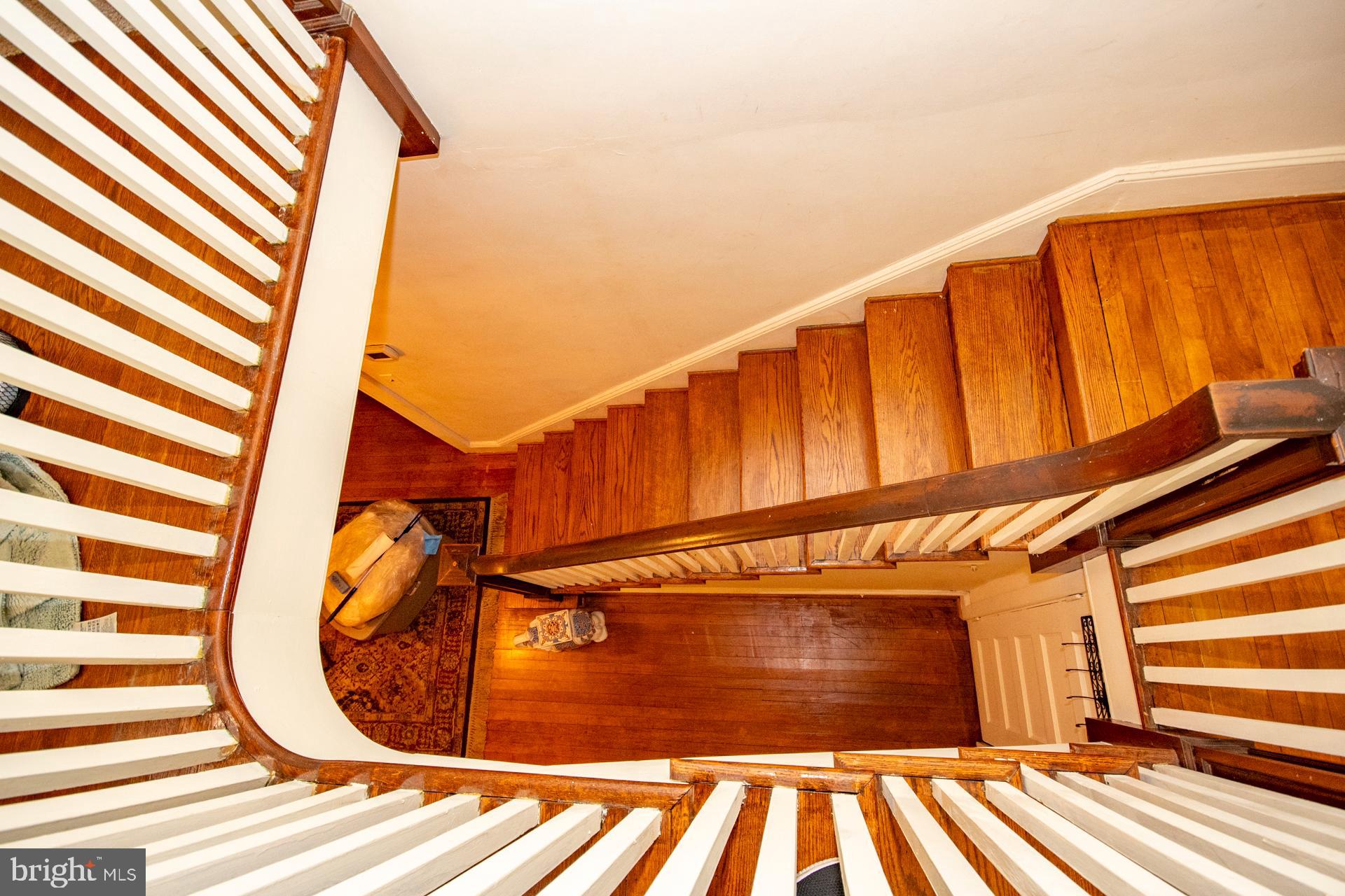 2705 Queen Anne Road Baltimore, MD 21216 - Photo 19 of 29 Original Hardwood Staircase