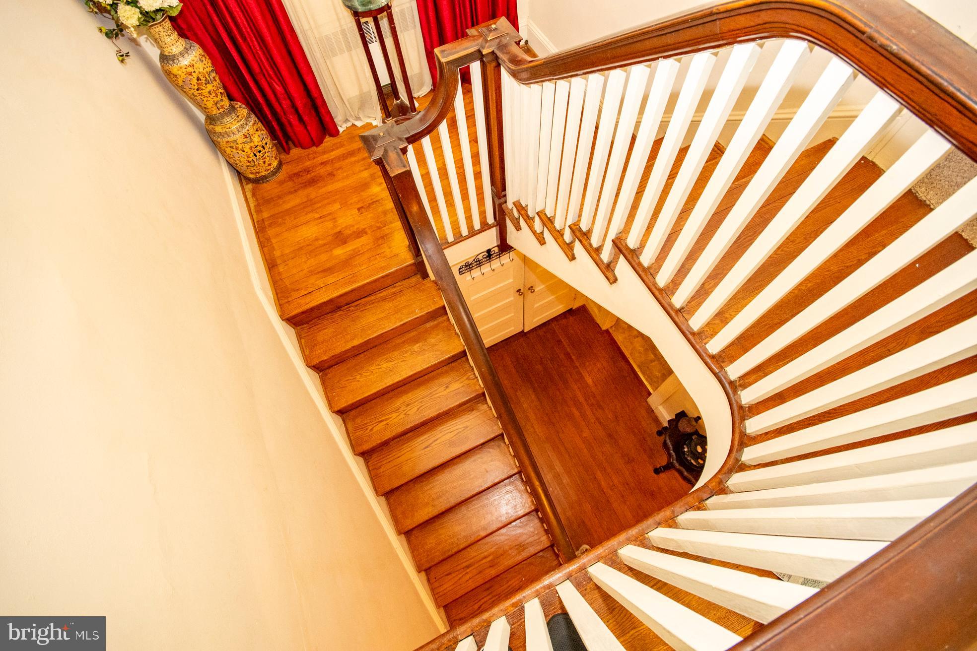 2705 Queen Anne Road Baltimore, MD 21216 - Photo 20 of 29 Original Hardwood Staircase
