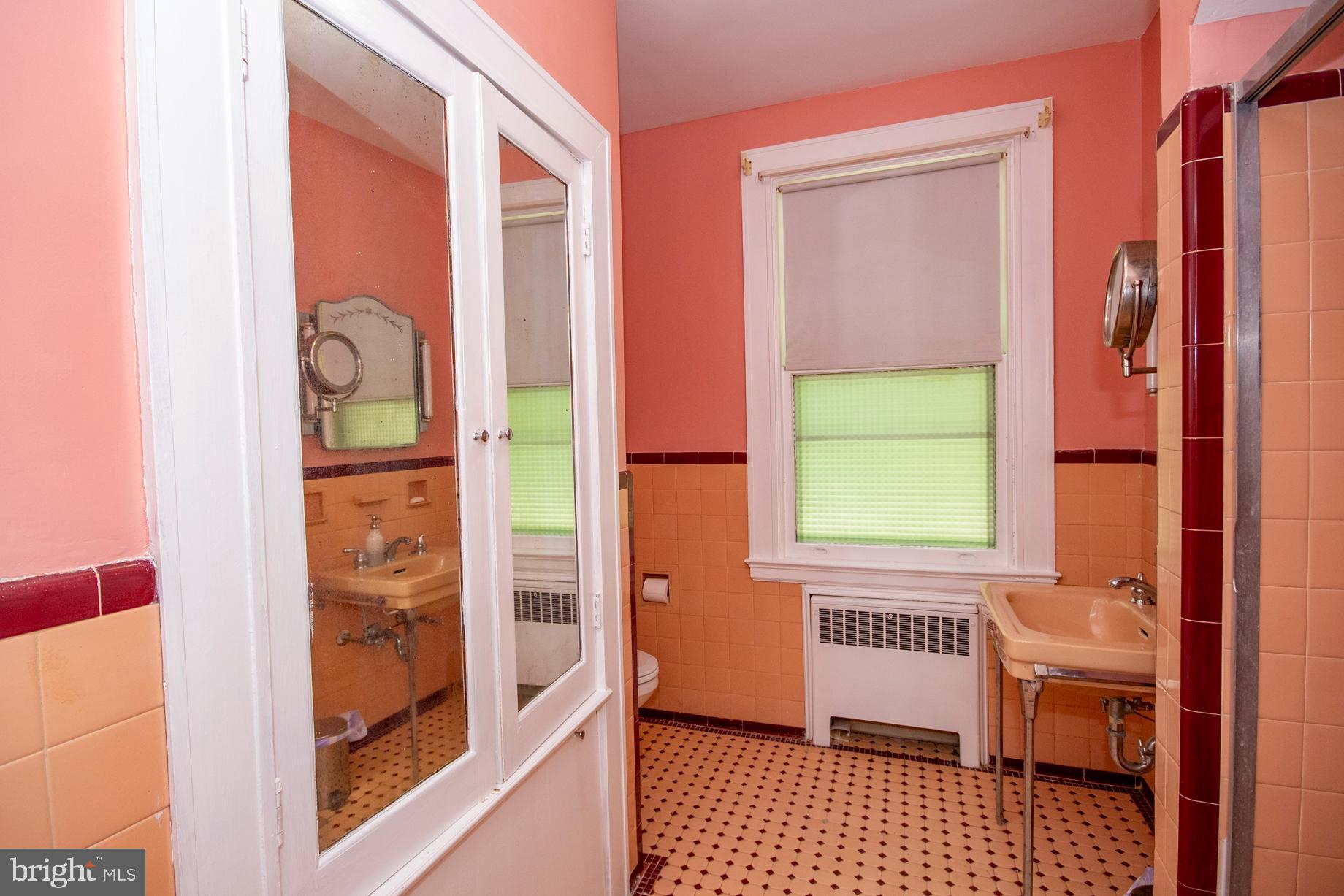 2705 Queen Anne Road Baltimore, MD 21216 - Photo 24 of 29 Hall Bathroom w/built in Hamper