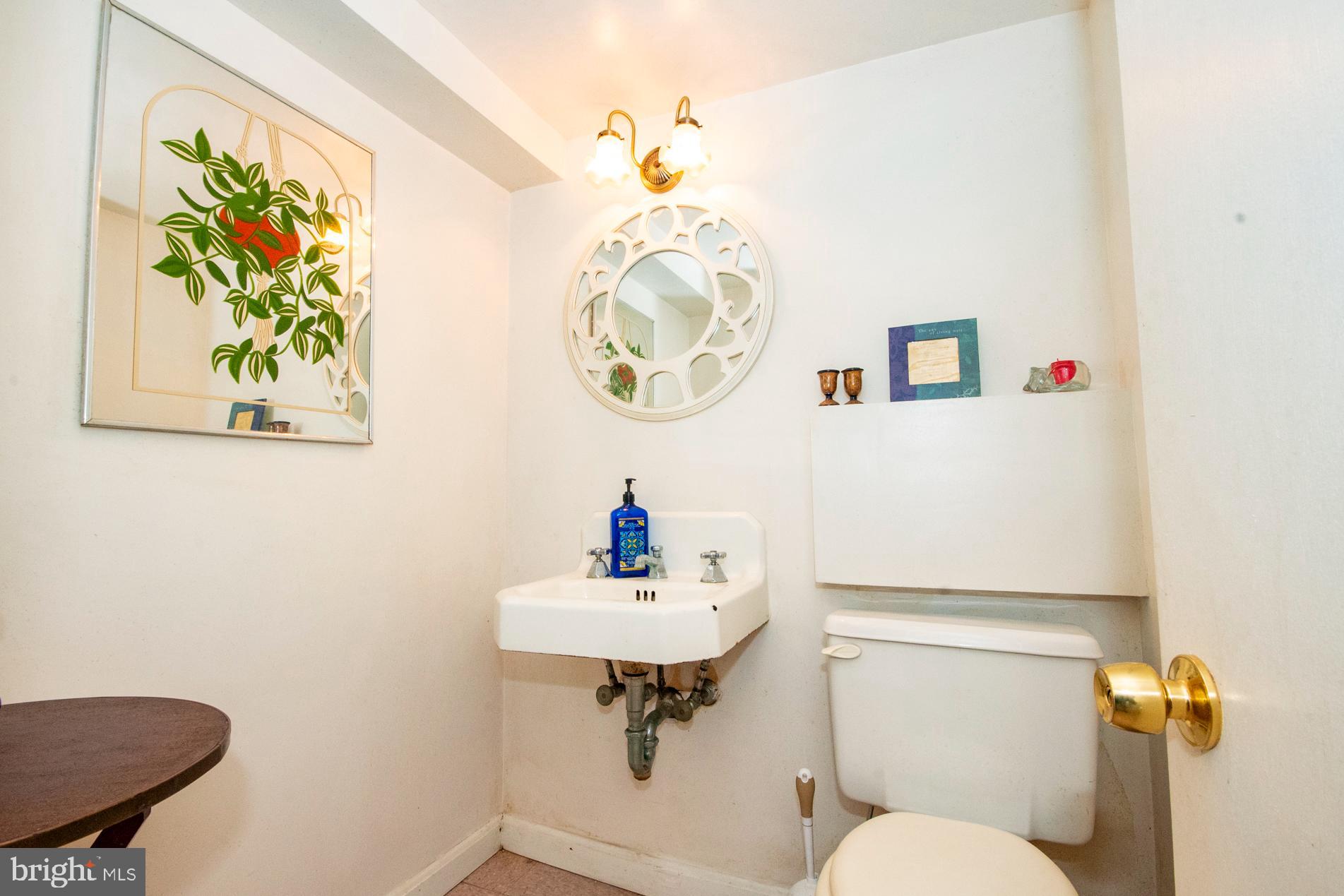 2705 Queen Anne Road Baltimore, MD 21216 - Photo 28 of 29 Lower Level Powder Room