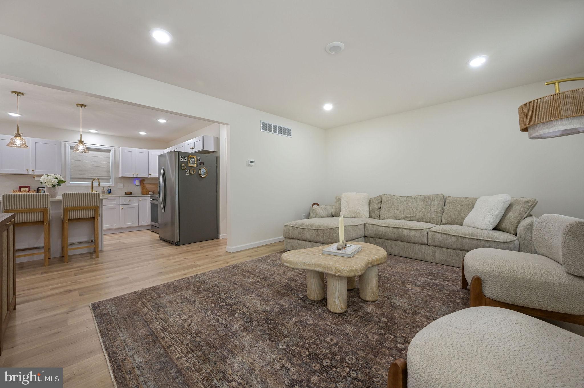 7 Porter Street Harrington, DE 19952 - Photo 11 of 24 a living room with furniture and a wooden floor