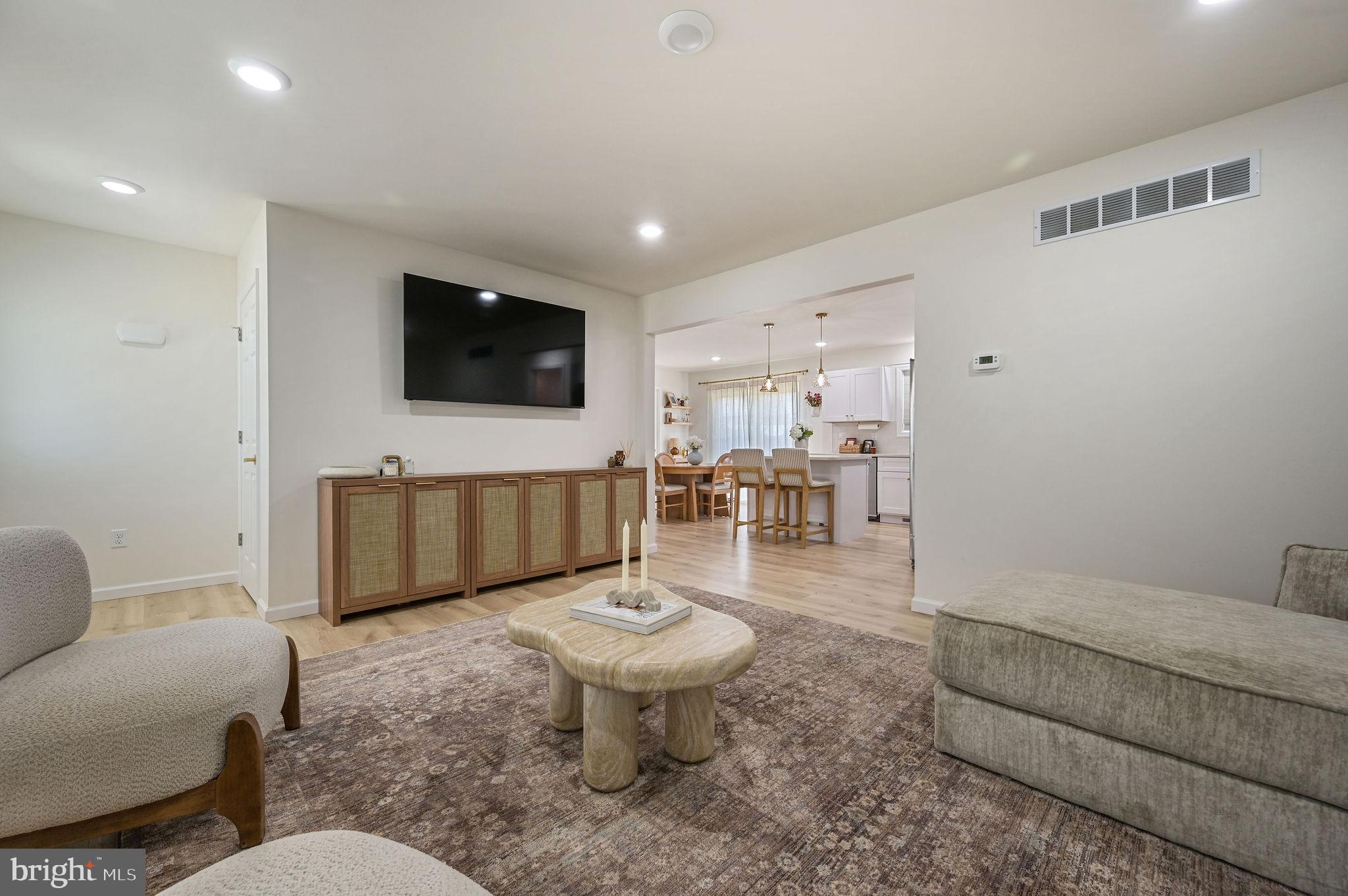 7 Porter Street Harrington, DE 19952 - Photo 12 of 24 a living room with furniture and a flat screen tv