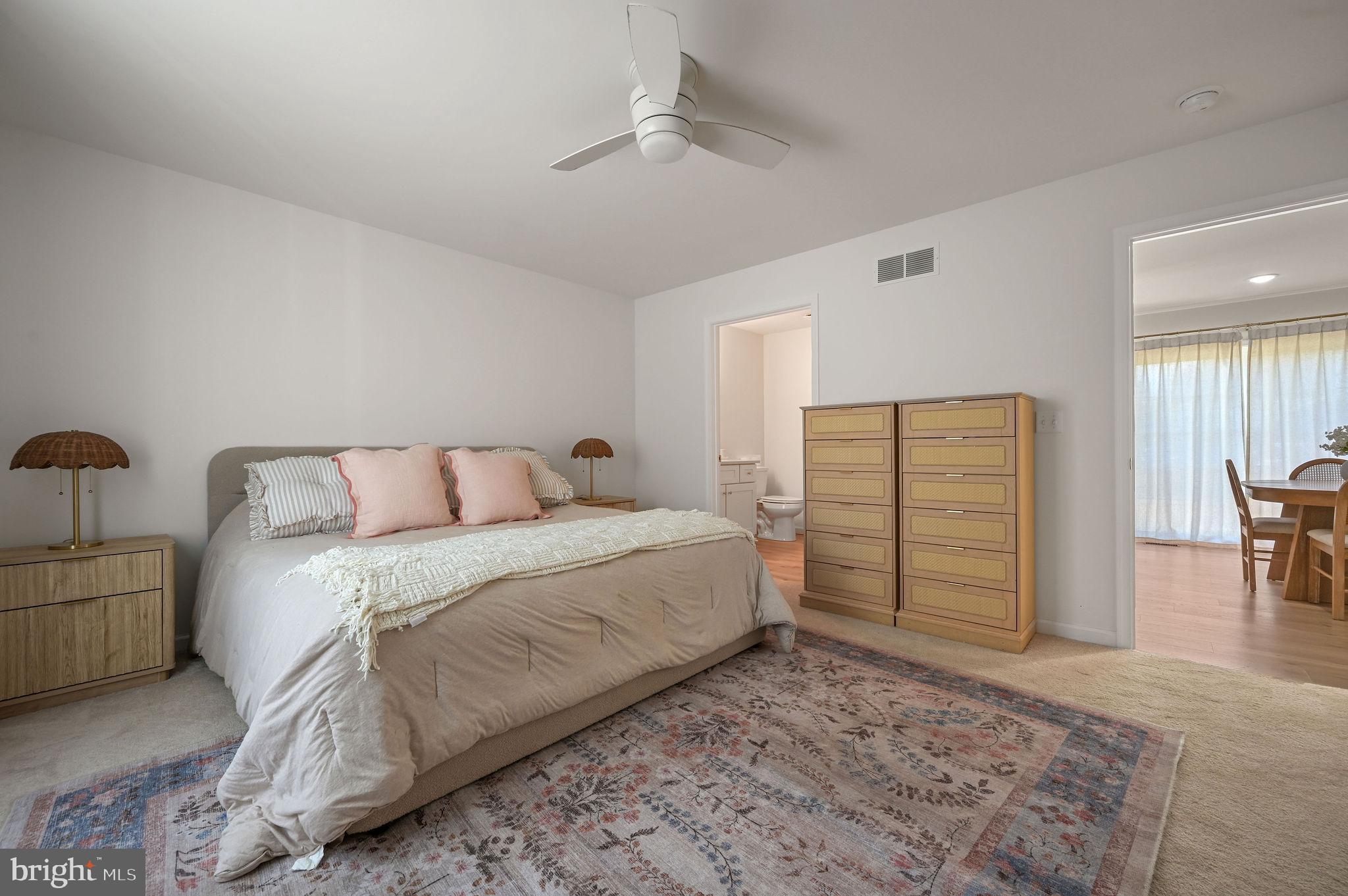 7 Porter Street Harrington, DE 19952 - Photo 14 of 24 a bedroom with a bed and a chair