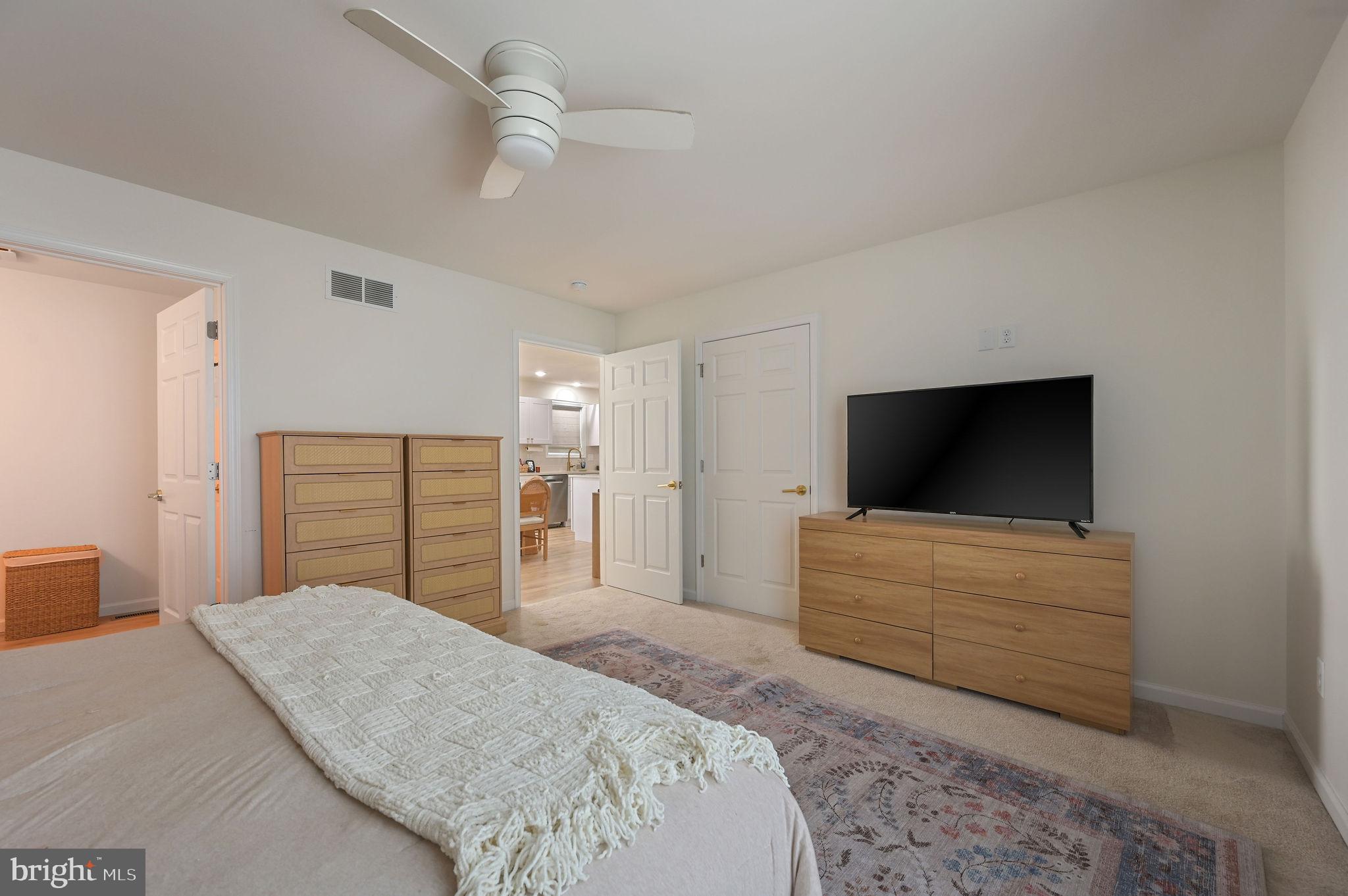7 Porter Street Harrington, DE 19952 - Photo 15 of 24 a bedroom with a bed and a flat screen tv