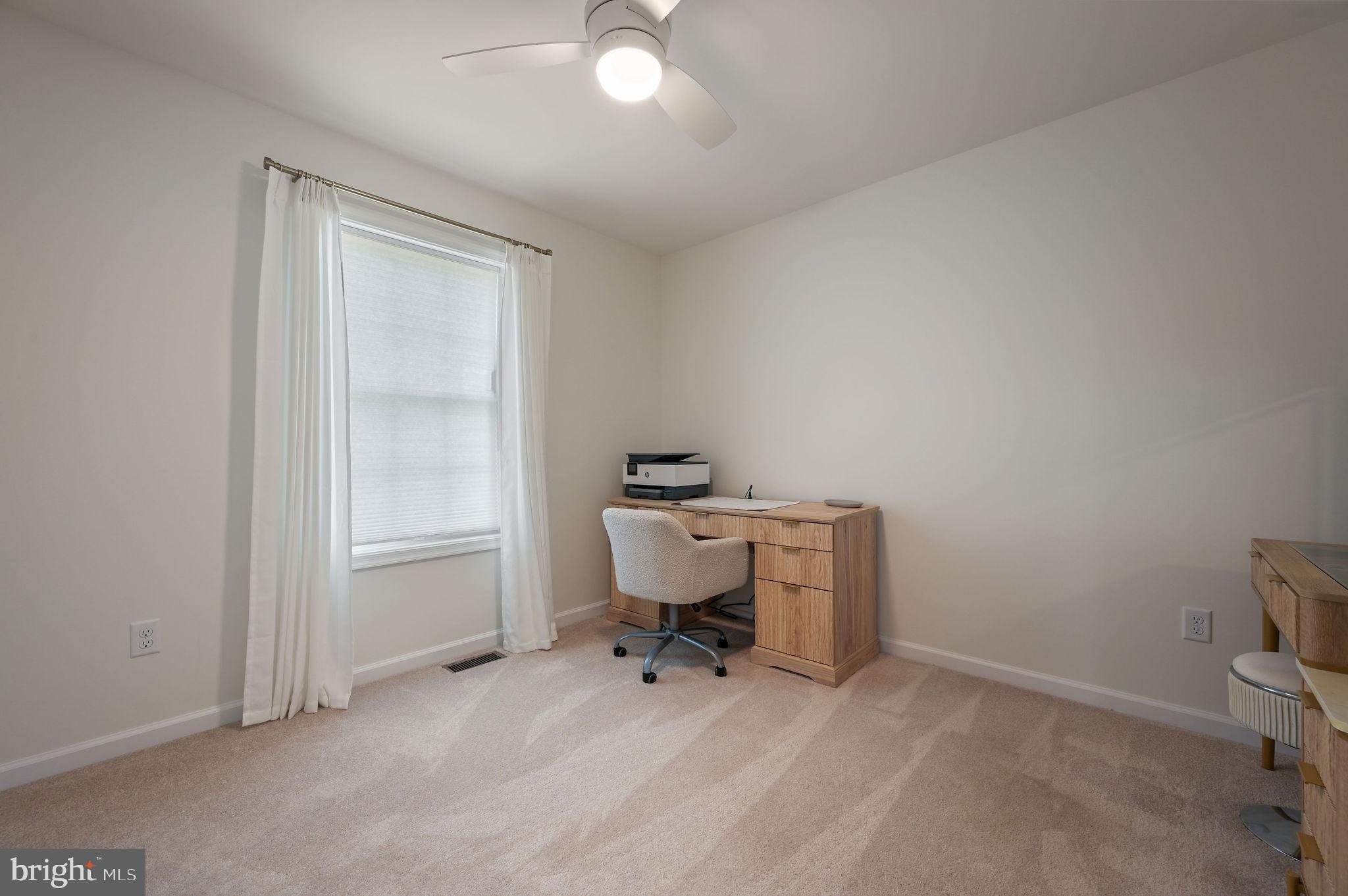 7 Porter Street Harrington, DE 19952 - Photo 17 of 24 a workspace with furniture and window