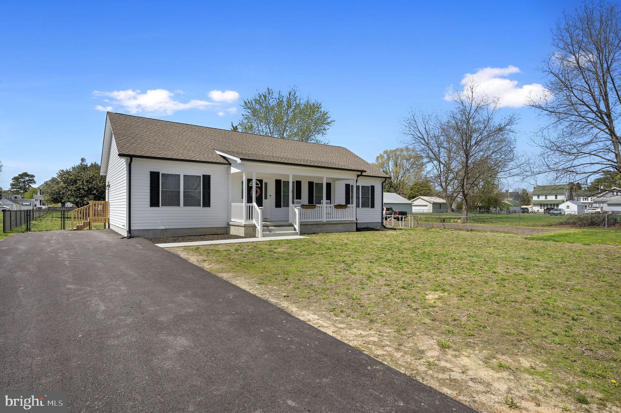 7 Porter Street Harrington, DE 19952 - Photo 22 of 24 a front view of a house with garden
