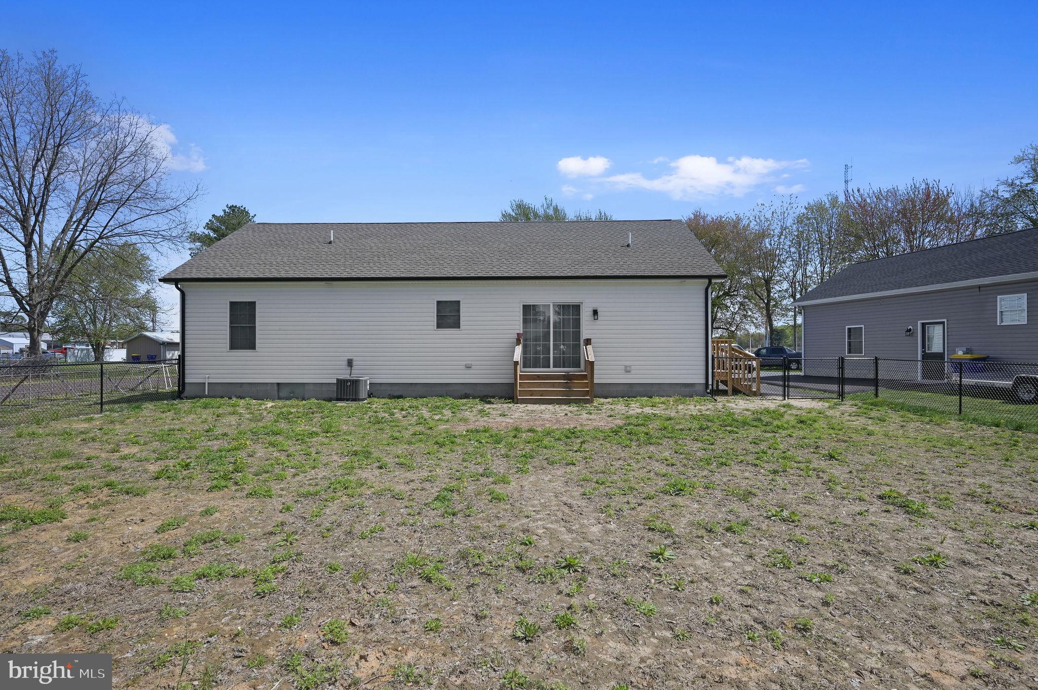 7 Porter Street Harrington, DE 19952 - Photo 23 of 24 a view of a house with backyard and garden