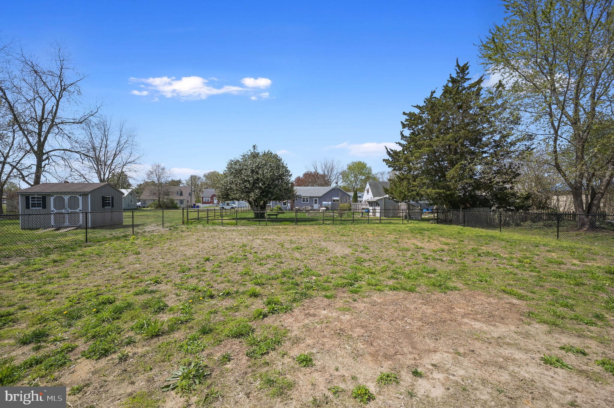 7 Porter Street Harrington, DE 19952 - Photo 24 of 24 a view of outdoor space with deck and yard