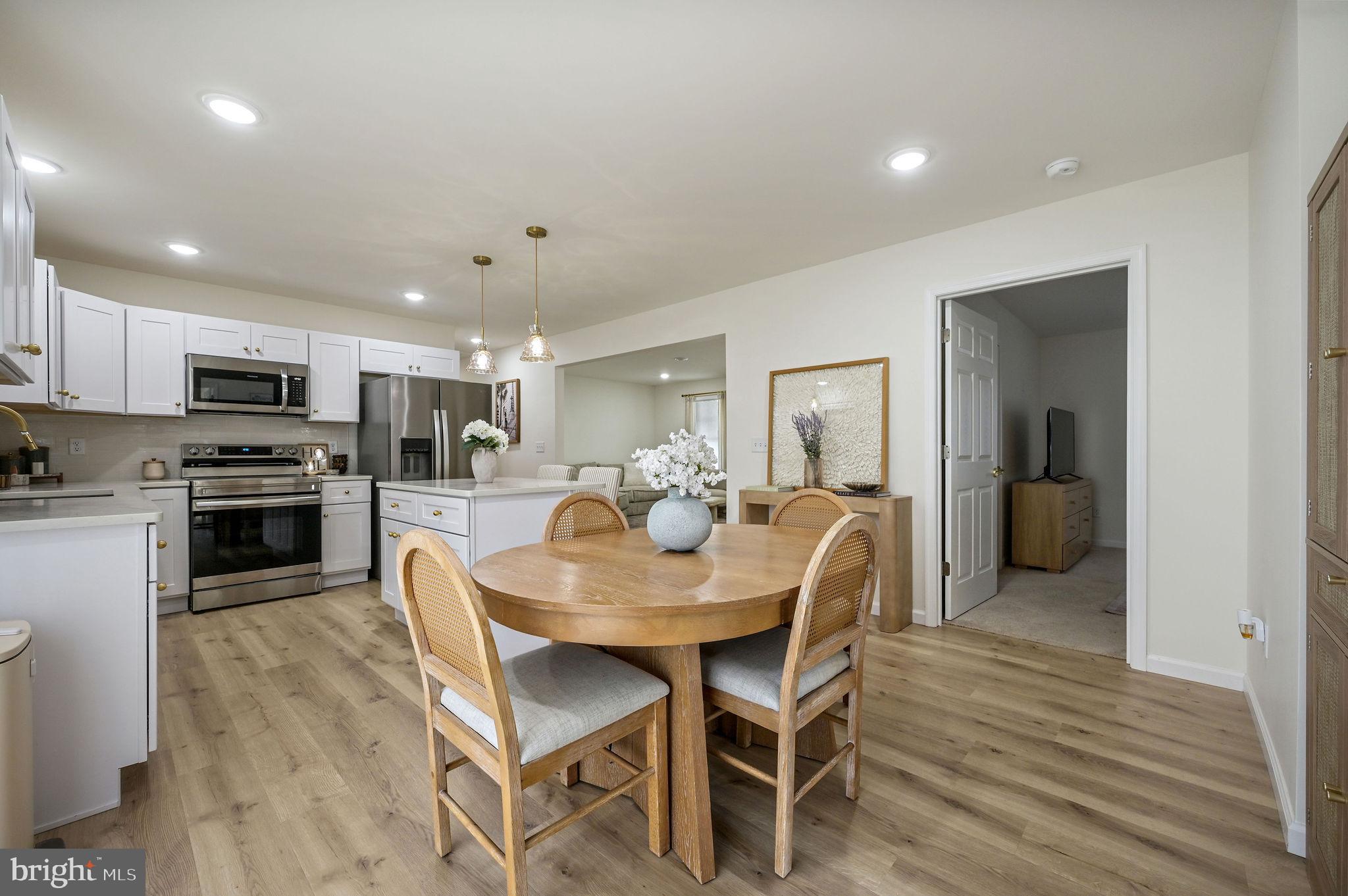 7 Porter Street Harrington, DE 19952 - Photo 7 of 24 a view of a dining room kitchen and a wooden floor
