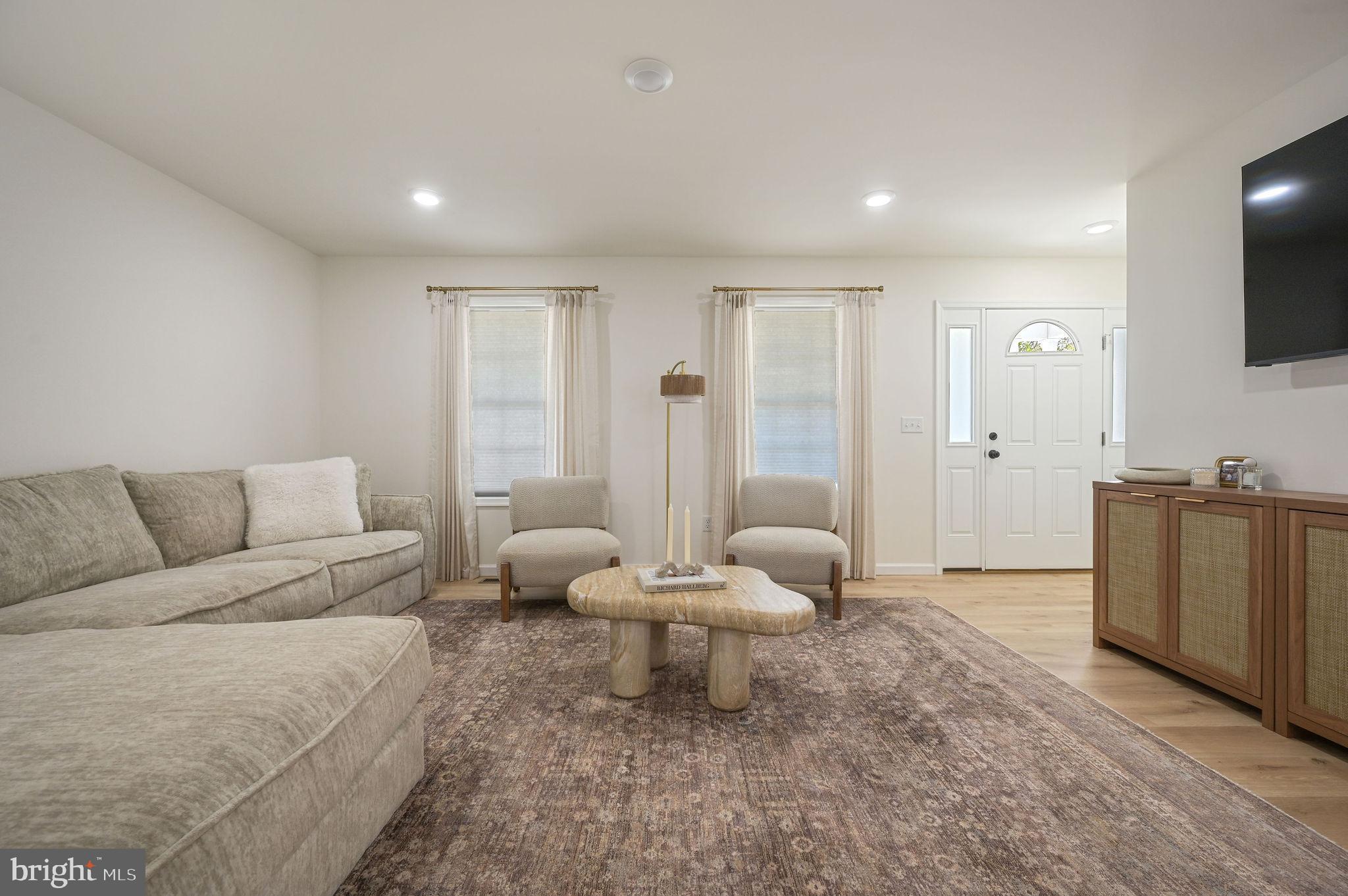 7 Porter Street Harrington, DE 19952 - Photo 10 of 24 a living room with furniture and a flat screen tv