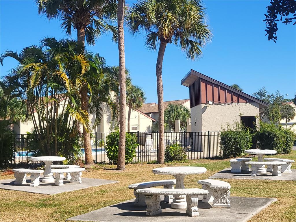 2707B Hidden Lake Boulevard, Unit D Sarasota, FL 34237 - Photo 12 of 20 a view of a swimming pool with a patio