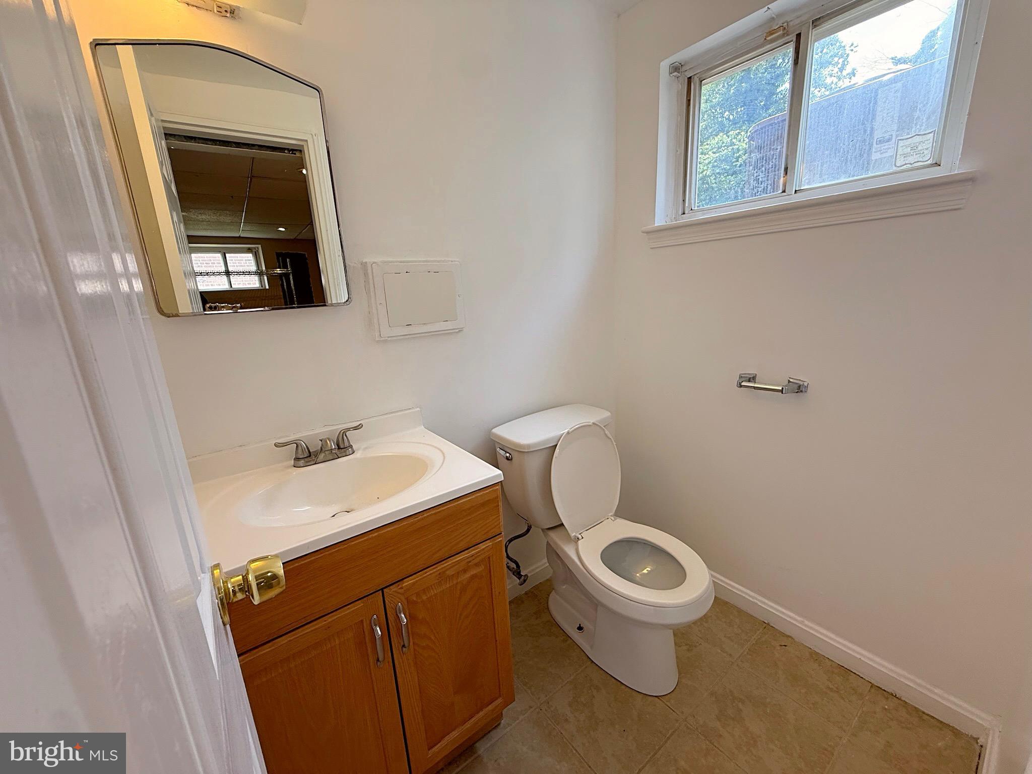 7104 Adelphi Road Hyattsville, MD 20782 - Photo 29 of 35 Half Bath by Laundry Room