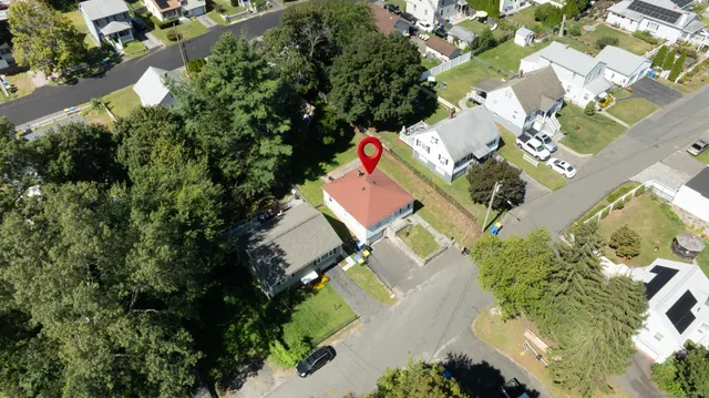 an aerial view of residential house with outdoor space