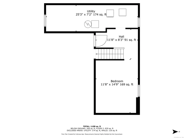 a picture of a bench in front of a wall