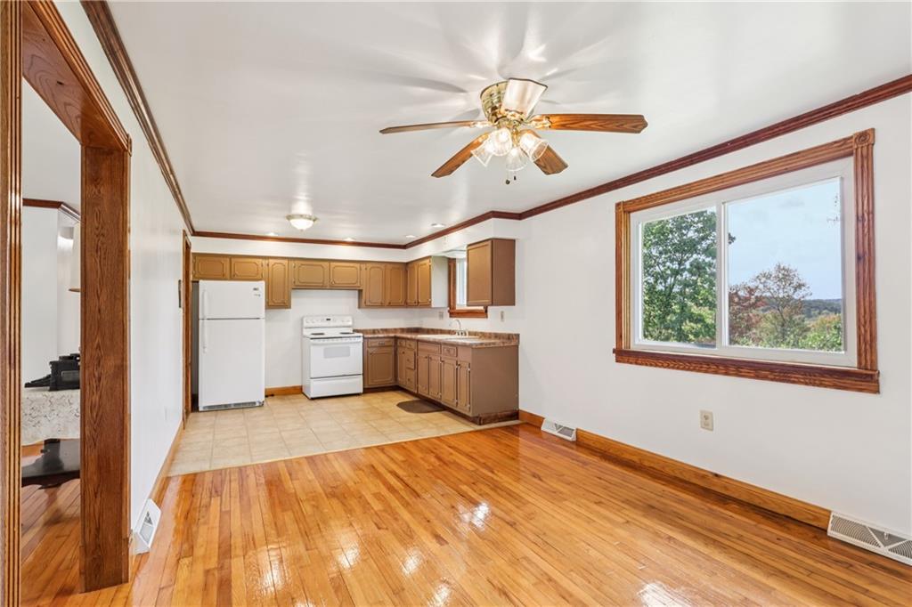 2043 Chicora Road Chicora, PA 16025 - Photo 8 of 50 a view of a livingroom with a ceiling fan