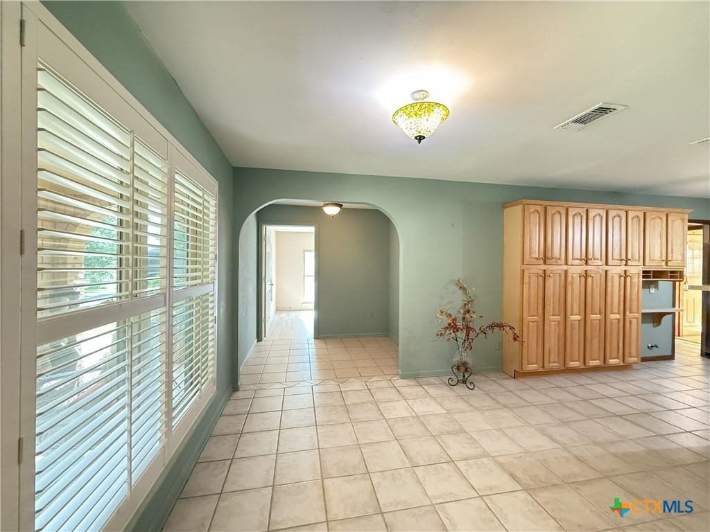 659 County Road 4744 Kempner, TX 76539 - Photo 11 of 48 Tiled flooring stretches from the foyer through the dining area and kitchen