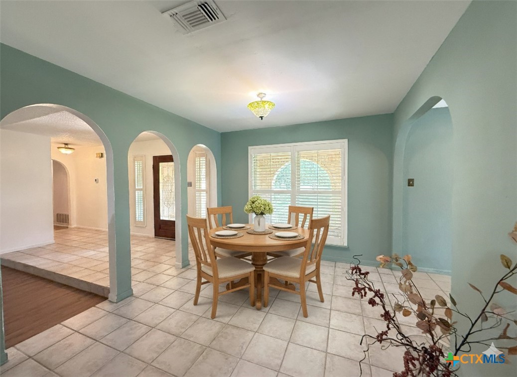 659 County Road 4744 Kempner, TX 76539 - Photo 12 of 48 a view of a dining room with furniture and wooden floor