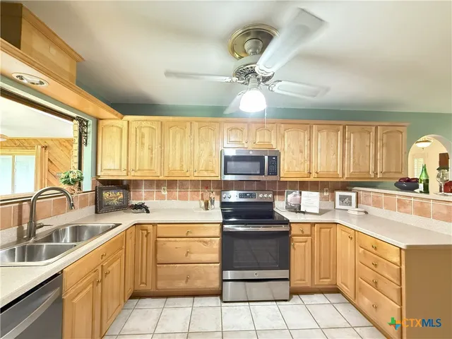 a view of a patio with swimming pool