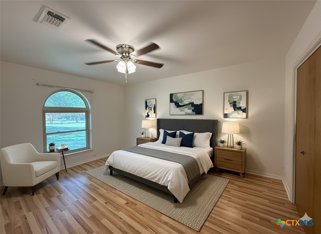 659 County Road 4744 Kempner, TX 76539 - Photo 26 of 48 a bedroom with a bed couch and a window