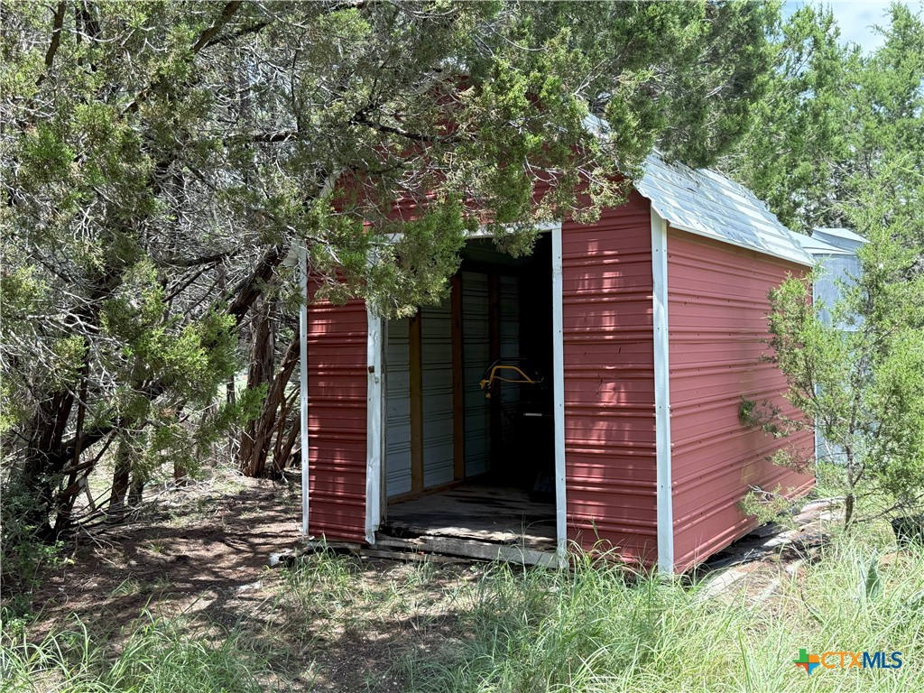659 County Road 4744 Kempner, TX 76539 - Photo 44 of 48 a view of a wooden door and a tree