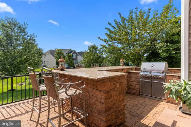 a view of a chairs and table in the patio