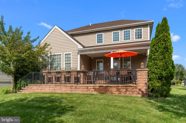 an aerial view of house with yard