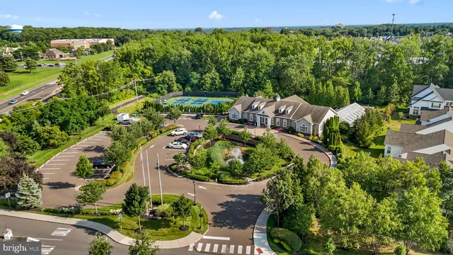 an aerial view of a house with a garden