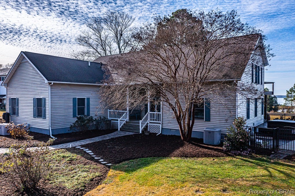 362 Beach Creek Road Lancaster, VA 22503 - Photo 5 of 47 View of front of property with a front yard and central AC