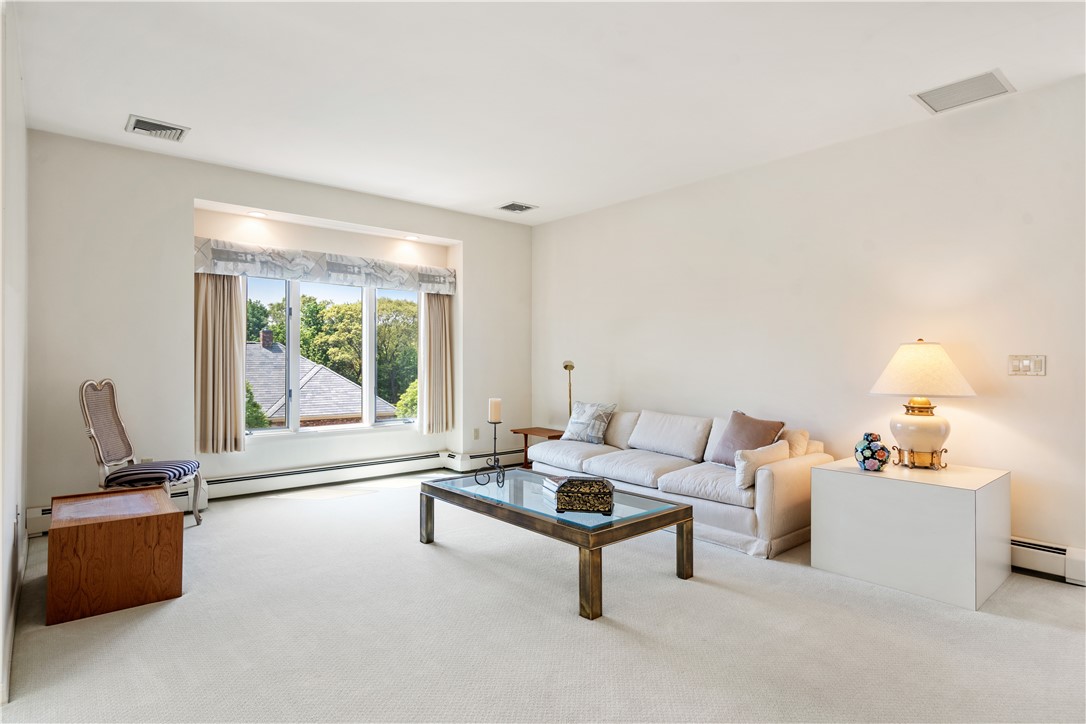 7 Oak Tree Lane Cranston, RI 02920 - Photo 23 of 32 Second floor has multiple uses; Family Room or Living area. Ideal for an older child or parent needing their own living quarters and expanded space.