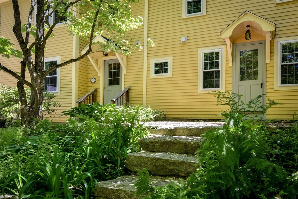 33 Grove Street Framingham, MA 01701 - Photo 24 of 33 a view of a house with a yard