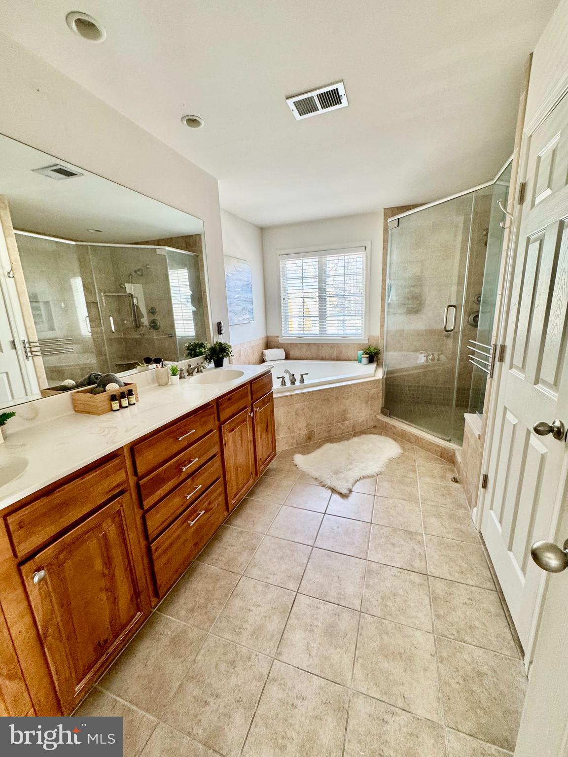 1002 Elbridge Way Severn, MD 21144 - Photo 33 of 49 Primary en-suite bath with shower and soaking tub