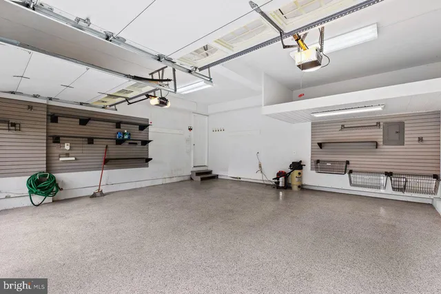 a balcony with wooden floor and fence