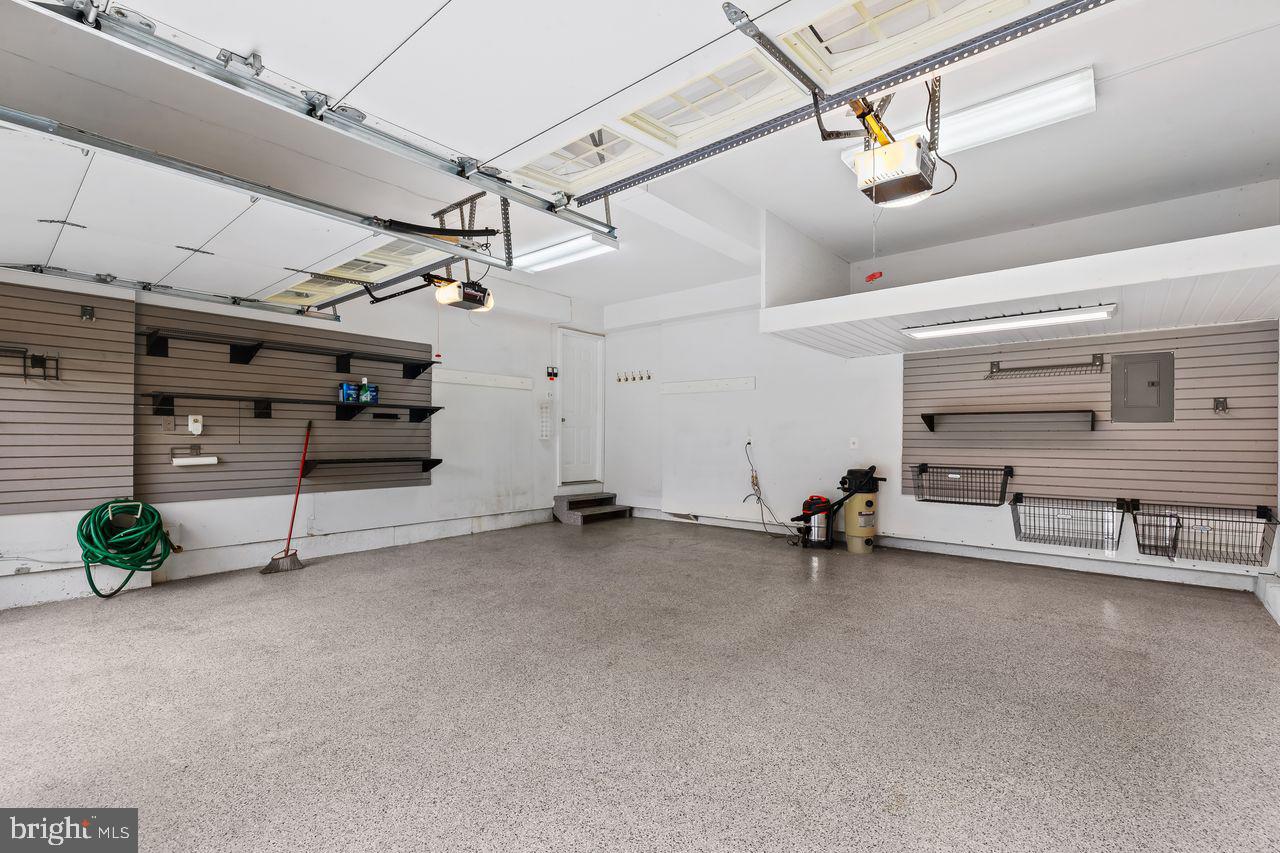 1002 Elbridge Way Severn, MD 21144 - Photo 42 of 49 More storage options in garage with shelving