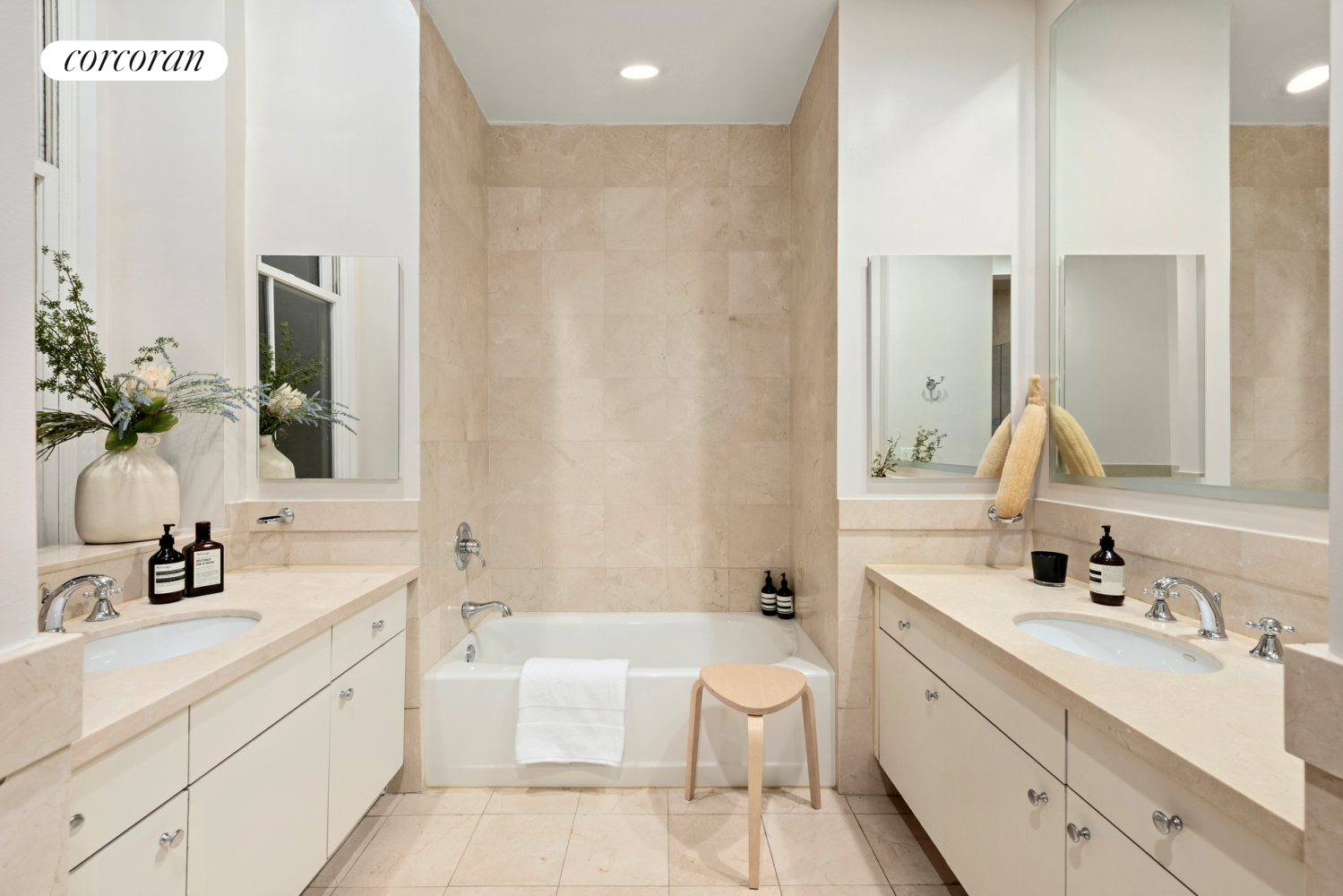 73 Worth Street, Unit 3A Manhattan, NY 10013 - Photo 13 of 18 a bathroom with a double vanity sink mirror double and bathtub