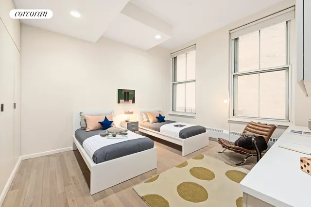 a bathroom with a double vanity sink mirror double and bathtub