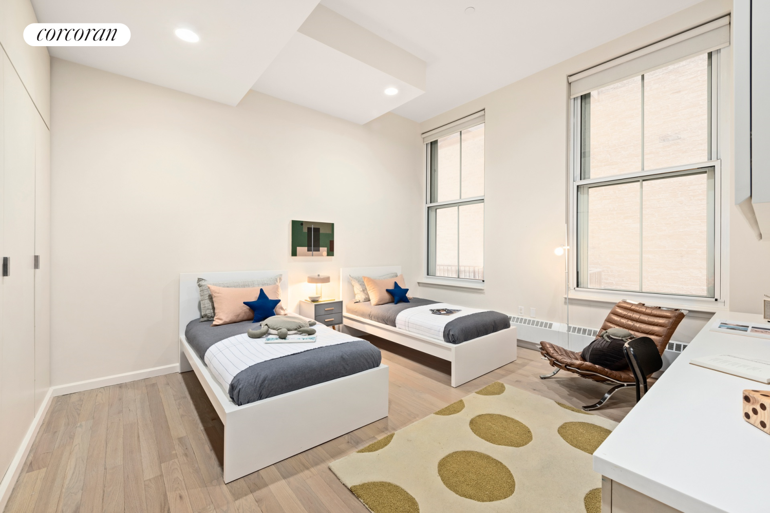 73 Worth Street, Unit 3A Manhattan, NY 10013 - Photo 14 of 18 a living room with furniture and a large window
