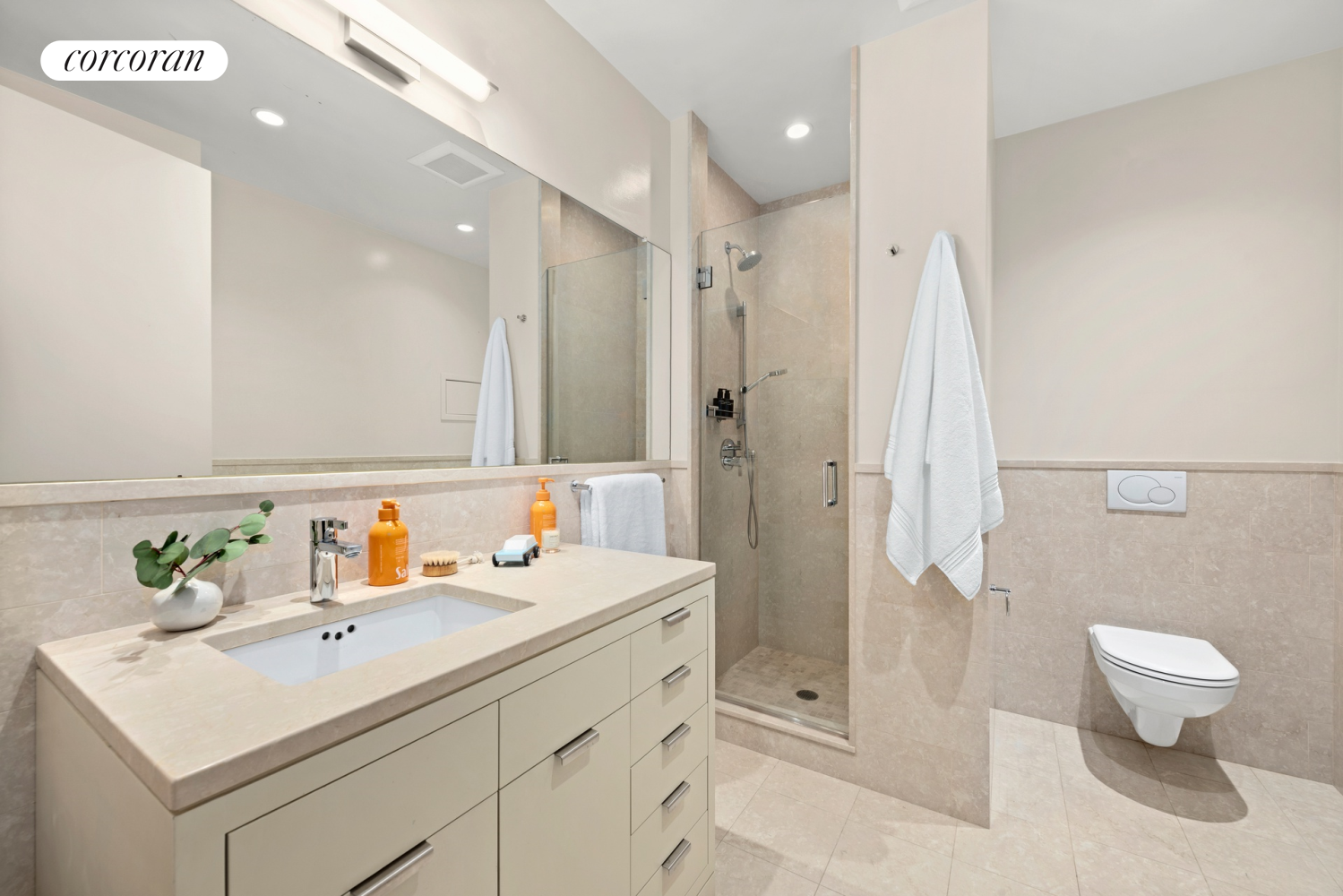 73 Worth Street, Unit 3A Manhattan, NY 10013 - Photo 16 of 18 a bathroom with a sink a toilet and shower