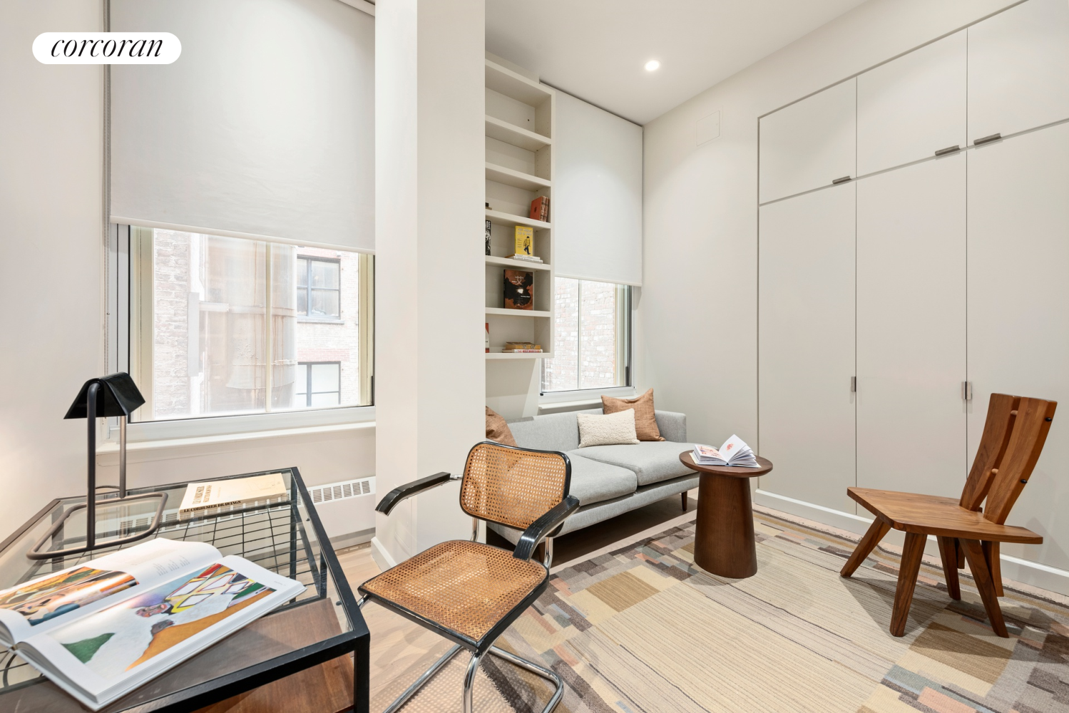 73 Worth Street, Unit 3A Manhattan, NY 10013 - Photo 17 of 18 a living room with furniture and a window