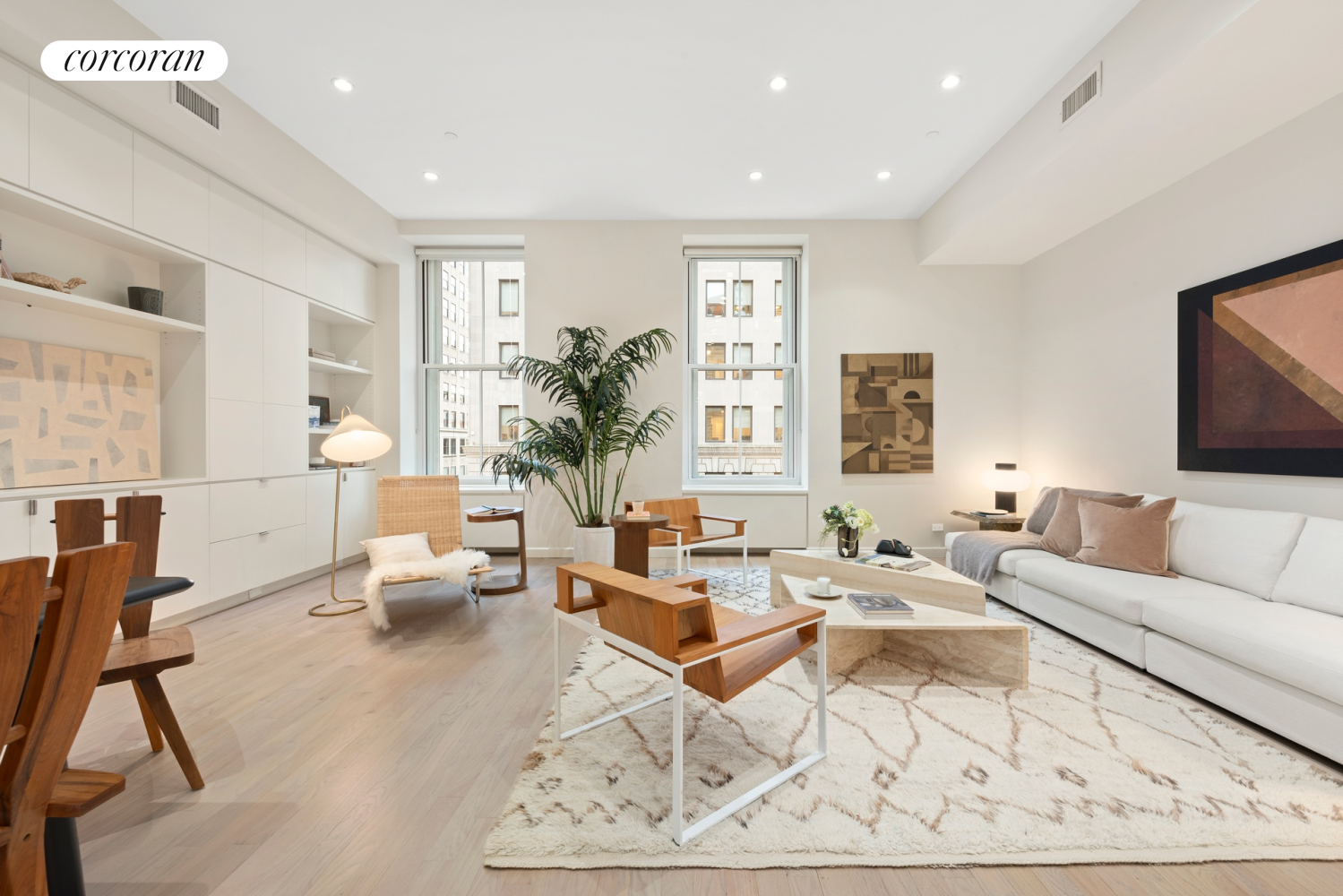 73 Worth Street, Unit 3A Manhattan, NY 10013 - Photo 4 of 18 a living room with furniture or couch and a flat screen tv