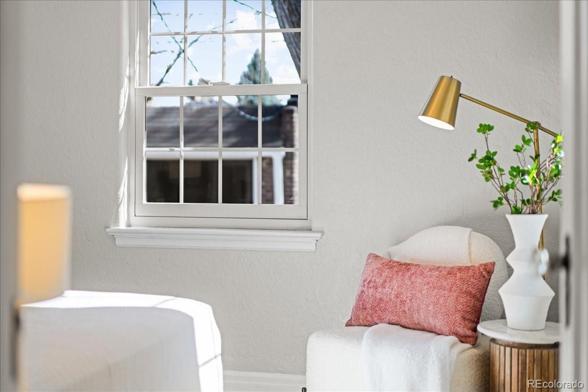 1378 Forest Street Denver, CO 80220 - Photo 21 of 50 a bedroom with a bed and a window