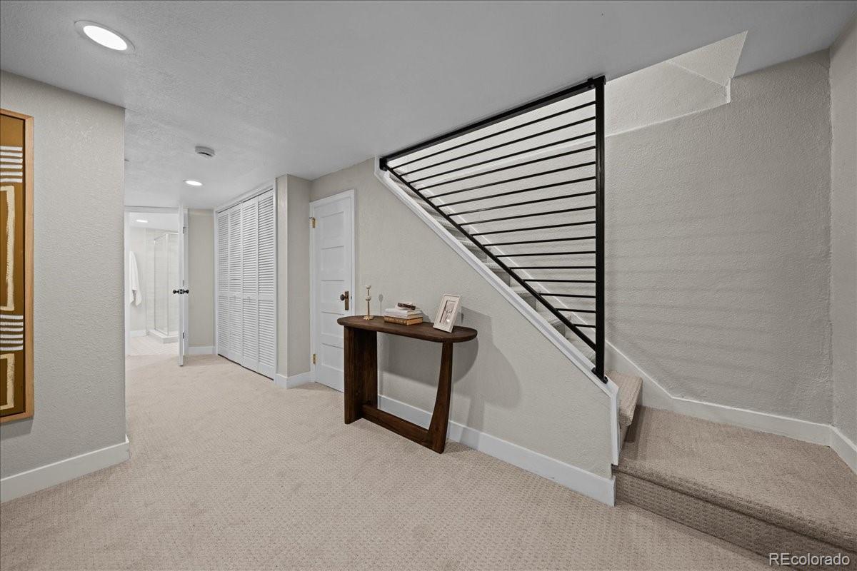 1378 Forest Street Denver, CO 80220 - Photo 24 of 50 a view of an empty room with stairs